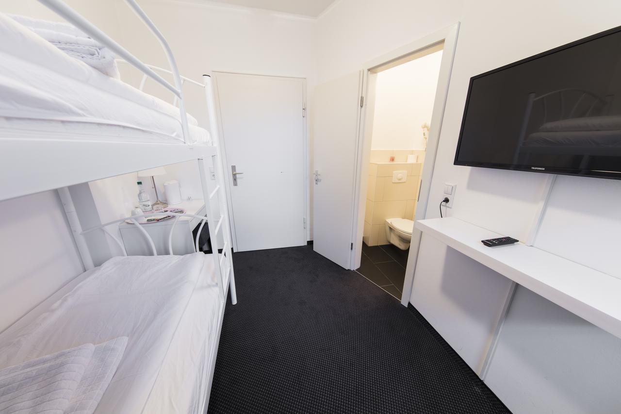 Chambre Quadruple avec Salle de Bains Privative
